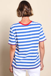 Model Riinar wearing size 10 of the Rhode Island Stripe Tee – Azure in colour Azure, from the back