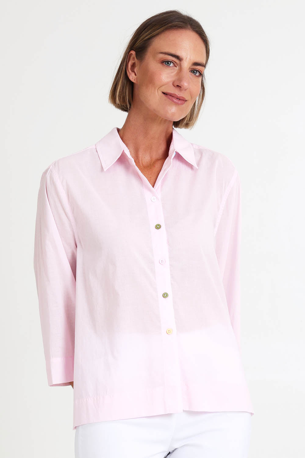 Model Riinar wearing size 10 of the Costa Mesa Cotton Shirt - Palepink in colour Palepink, in a cropped view