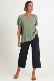 Model Riinar wearing size 10 of the Zara Wide Leg Pant - Black in colour Black, from the front