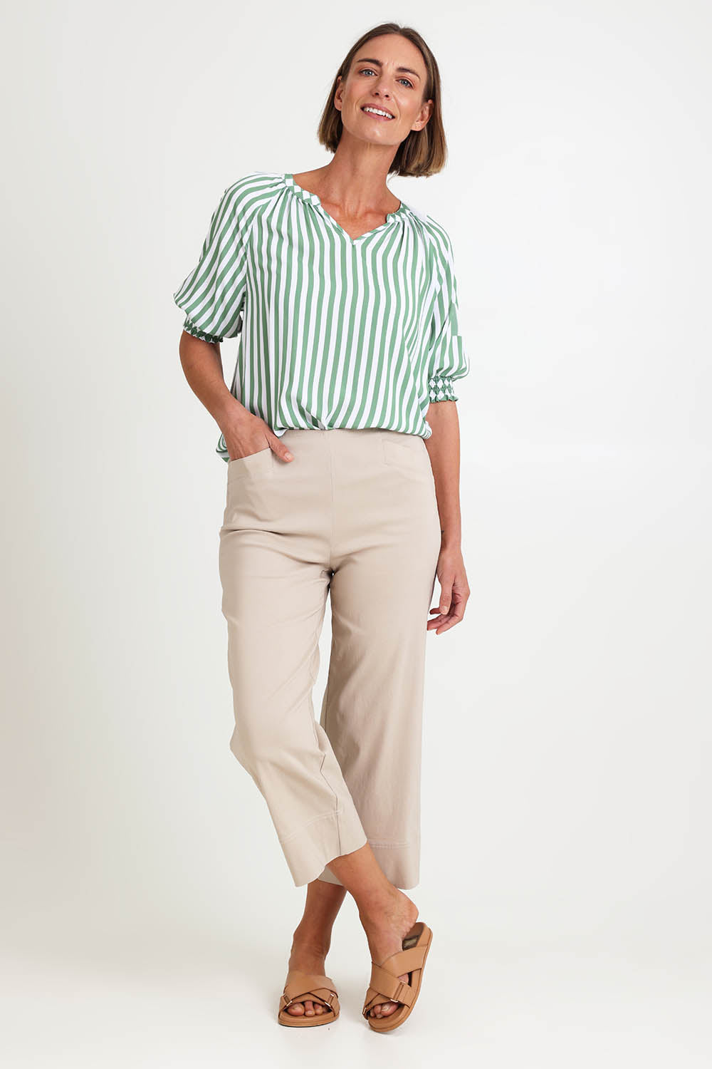 Model Riinar wearing size 10 of the Zara Wide Leg Pant - Natural in colour Natural, from the front