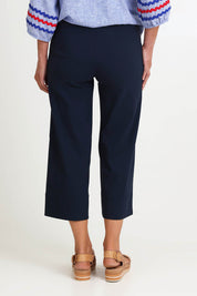 Model Riinar wearing size 10 of the Zara Wide Leg Pant - Navy in colour Navy, from the back