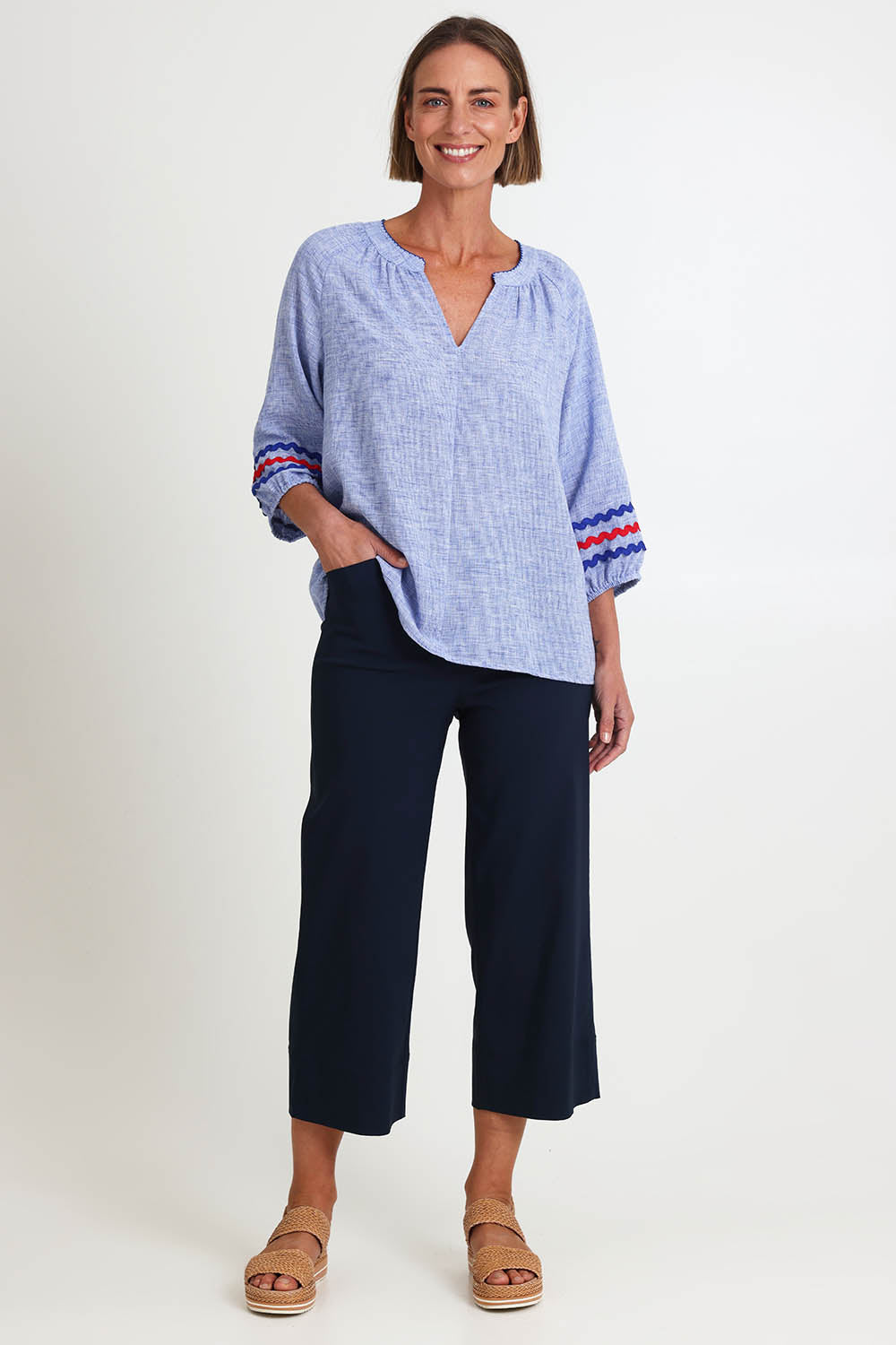 Model Riinar wearing size 10 of the Zara Wide Leg Pant - Navy in colour Navy, from the front