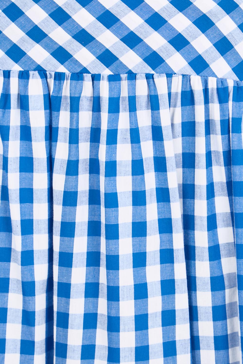 Product shot of the Amalfi Check Skirt – Azure in colour Azure, showing detail
