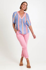 Model Riinar wearing size 10 of the Laguna Stripe Top – Denimmulti in colour Denimmulti, from the front
