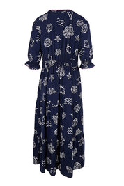 Product shot of the Montecito Print Dress – Navy in colour Navy, from the back