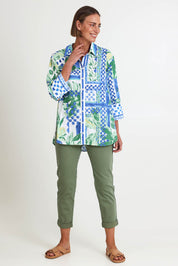 Model Riinar wearing size 10 of the Limoncello Print Shirt – Apple in colour Apple, from the front