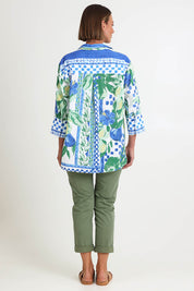 Model Riinar wearing size 10 of the Limoncello Print Shirt – Apple in colour Apple, from the front