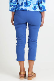 Model Riinar wearing size 10 of the Zara Pant - Blue in colour Blue, from the back