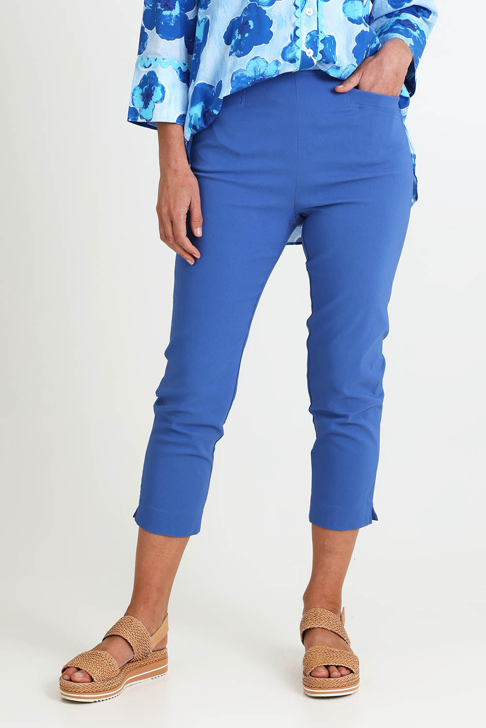 Model Riinar wearing size 10 of the Zara Pant - Blue in colour Blue, in a cropped view