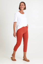 Model Riinar wearing size 10 of the Zara Pant - Ginger in colour Ginger, from the front