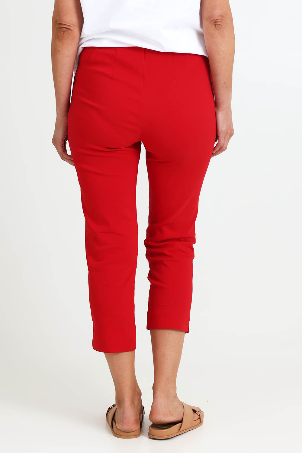 Model Riinar wearing size 10 of the Zara Pant - Red in colour Red, from the back