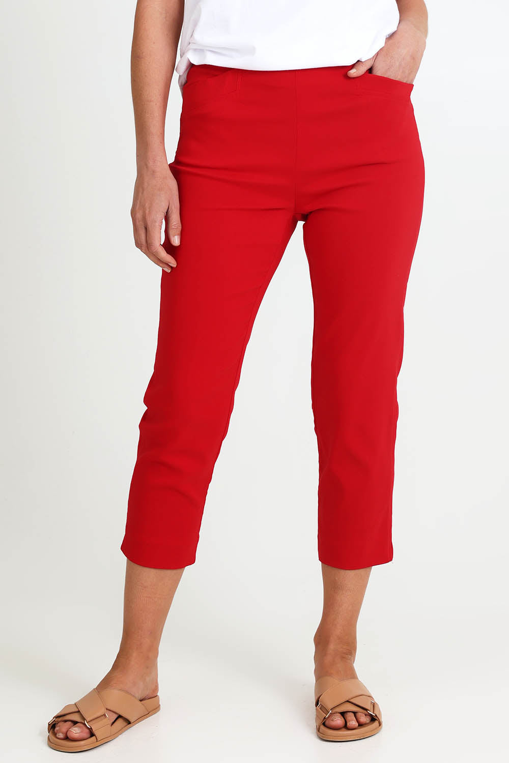 Model Riinar wearing size 10 of the Zara Pant - Red in colour Red, in a cropped view