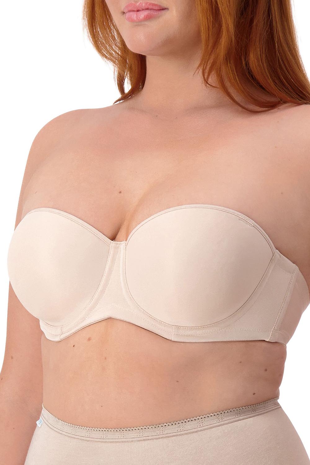 A model wearing the Beautiful Silhouette Bra in colour Teint, from the front, cropped image