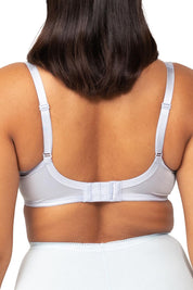 A model wearing the Lacy Minimizer Bra in colour White (White), from the back