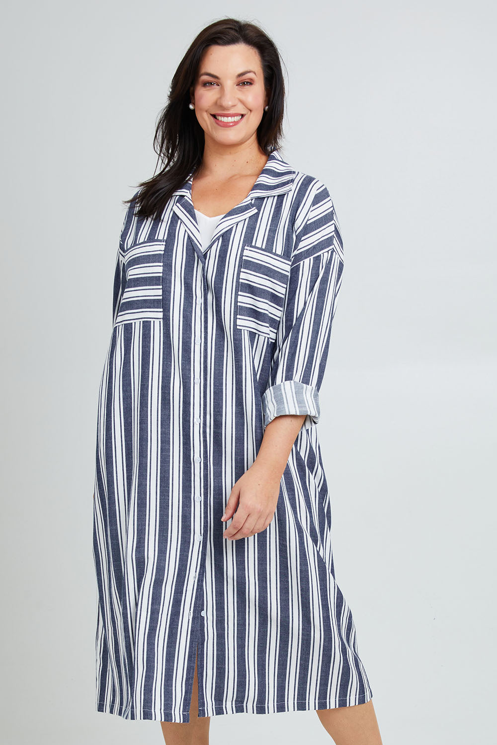 Model Poppy wearing the Oversized Cotton Linen Sleep Shirt in colour Navystripe (Blue), from the front, cropped image