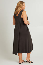Model Fiona wearing the Modal Back Wrap Midi Dress in colour Deepgreen (Green), from the back