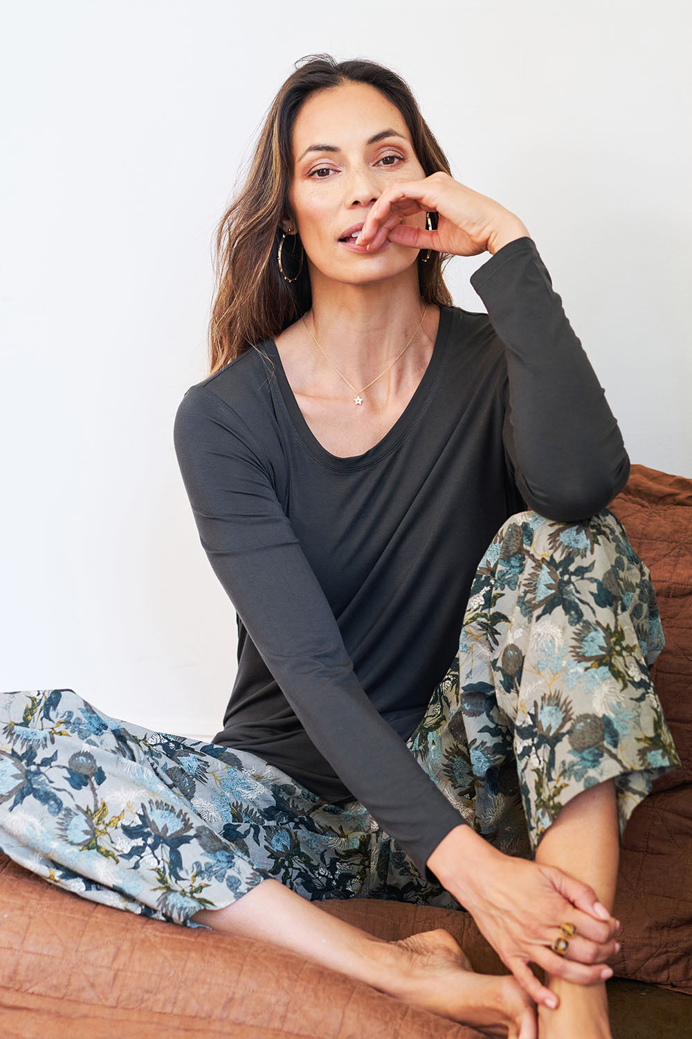 Model Amanda wearing the Classic Fit Long Sleeve Modal Tee in colour Deepgreen (Green), from the front, showing the whole outfit