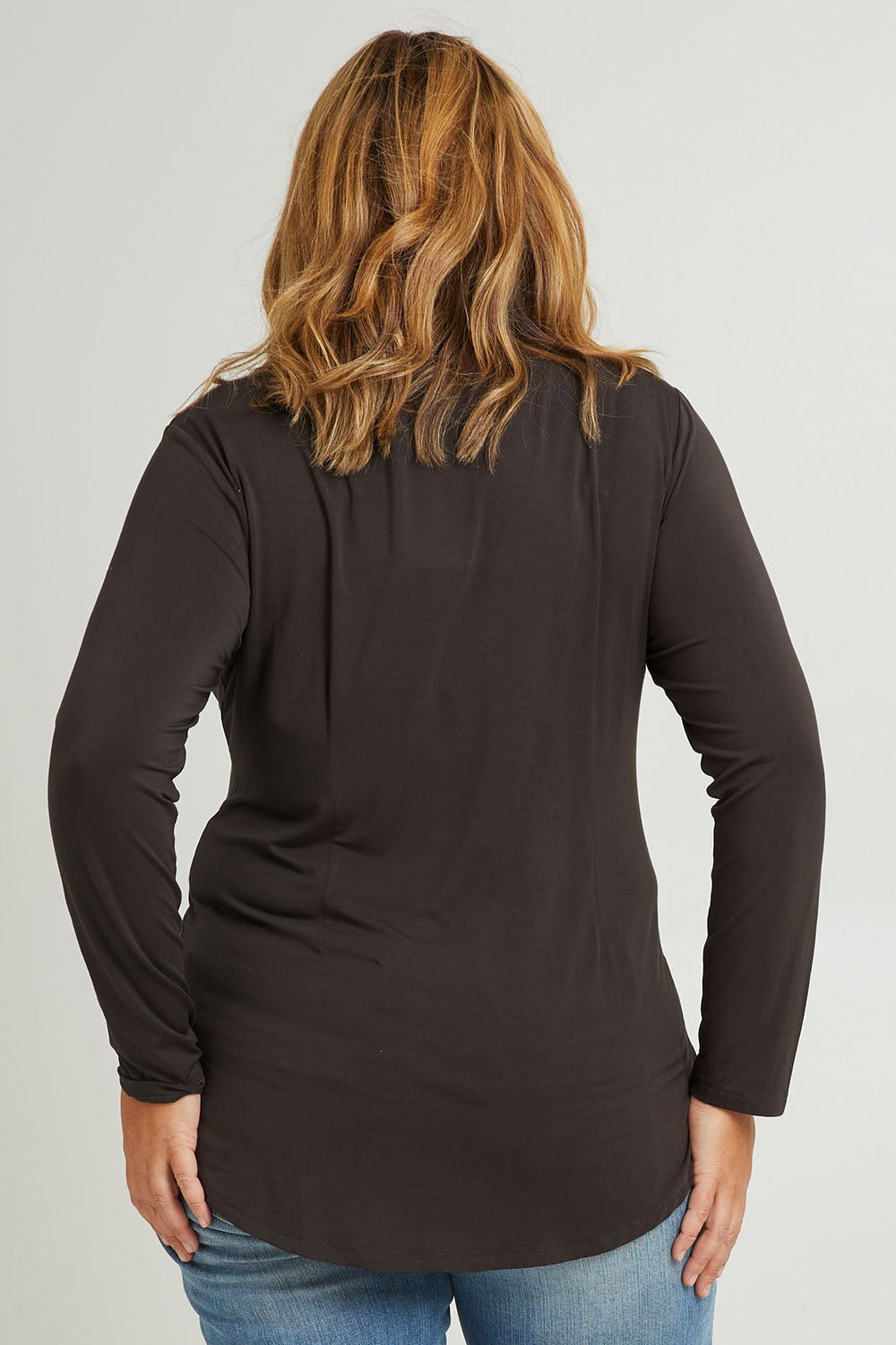 Model Fiona wearing the Classic Fit Long Sleeve Modal Tee in colour Deepgreen (Green), from the back