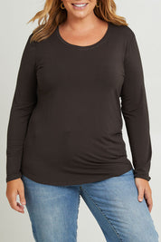 Model Fiona wearing the Classic Fit Long Sleeve Modal Tee in colour Deepgreen (Green), from the front, cropped image