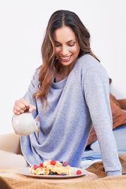 Model Amanda wearing the Raglan Sleeve Pullover in colour Indigo (Blue), from the front, cropped image