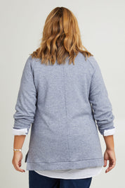 Model Fiona wearing the Raglan Sleeve Pullover in colour Indigo (Blue), from the back