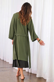 Model Amanda wearing the Cotton Waffle Dressing Robe in colour Norigreen (Green), from the back