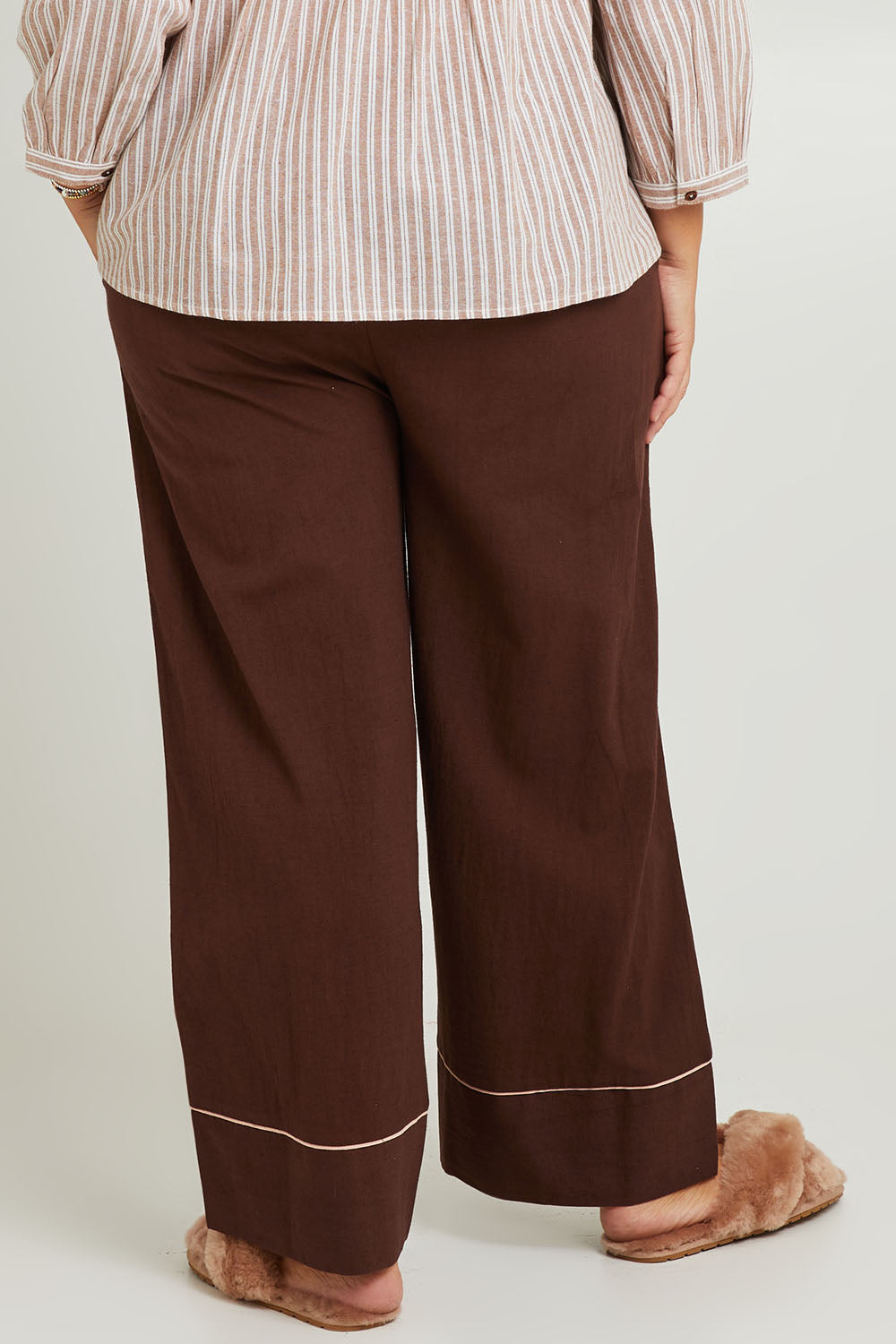 Model Fiona wearing the Cotton Full Length Pyjama Pants in colour Chocolate, from the back