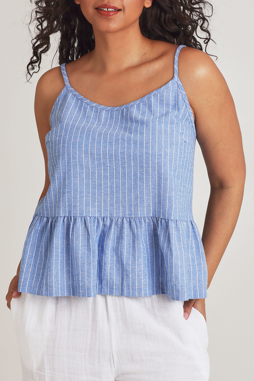 Model Terri-Leigh wearing the Cotton Linen Striped Cami in colour Denimstrip (Blue), from the front, cropped image