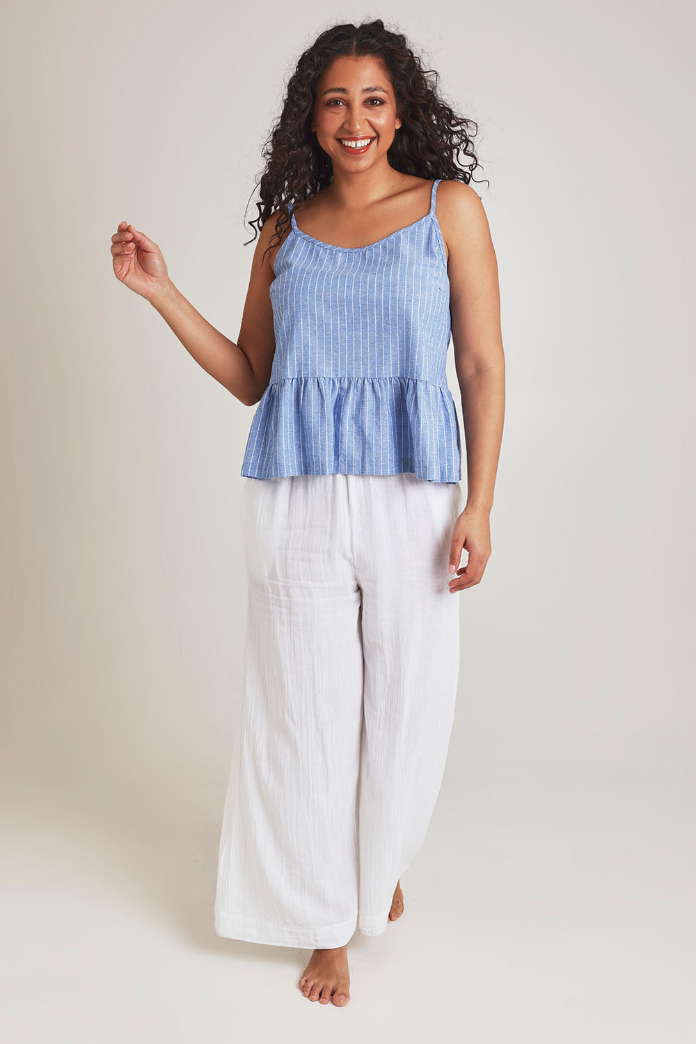 Model Terri-Leigh wearing the Cotton Linen Striped Cami in colour Denimstrip (Blue), from the front, showing the whole outfit
