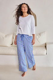 Model Tahneei wearing size 10 of the Cotton Check Pyjama Pants – Blue in colour Blue, from the front