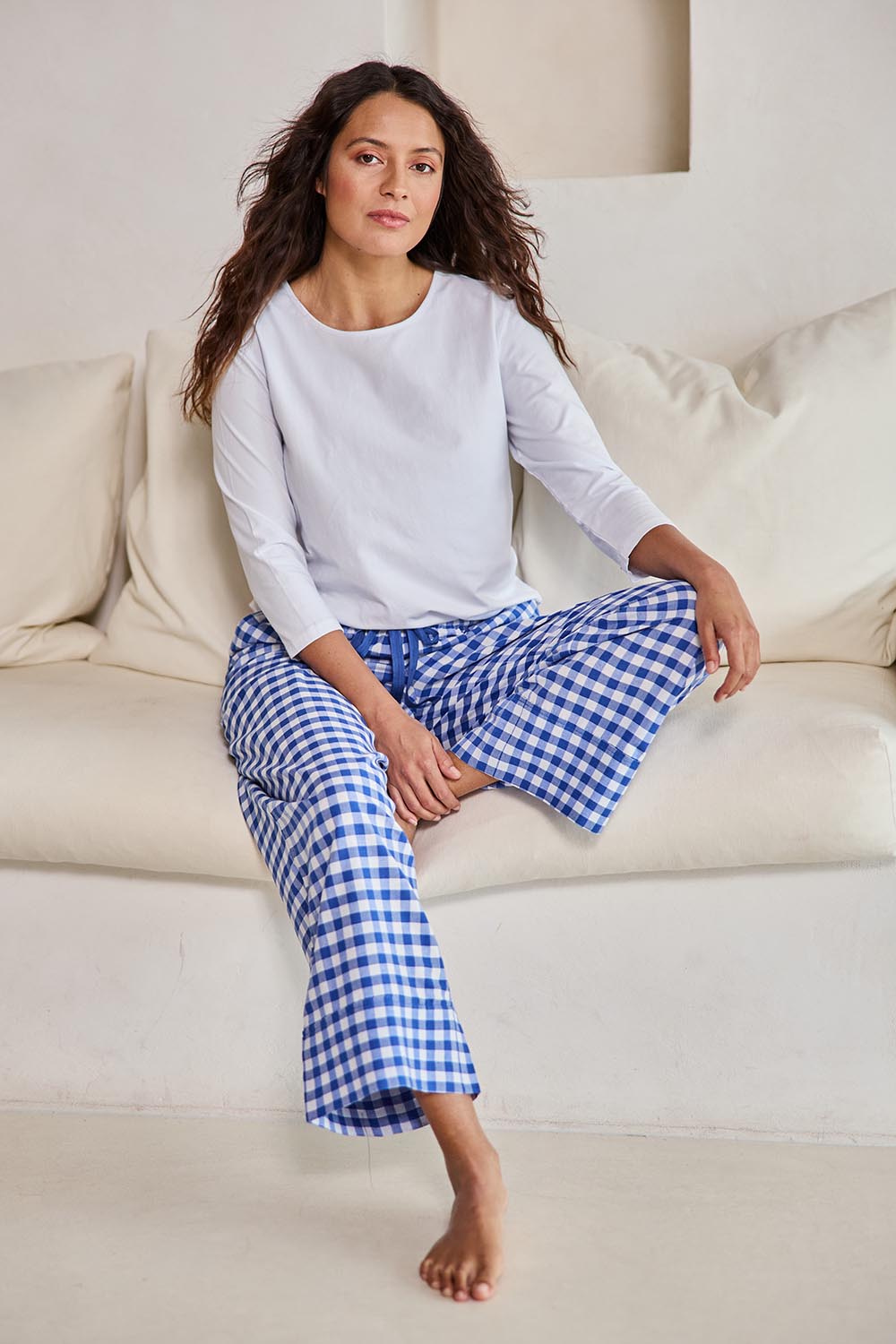 Model Tahneei wearing size 10 of the Cotton Check Pyjama Pants – Blue in colour Blue, from the front