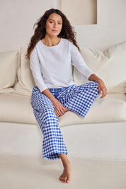 Model Tahneei wearing size 10 of the Cotton Check Pyjama Pants – Blue in colour Blue, from the front