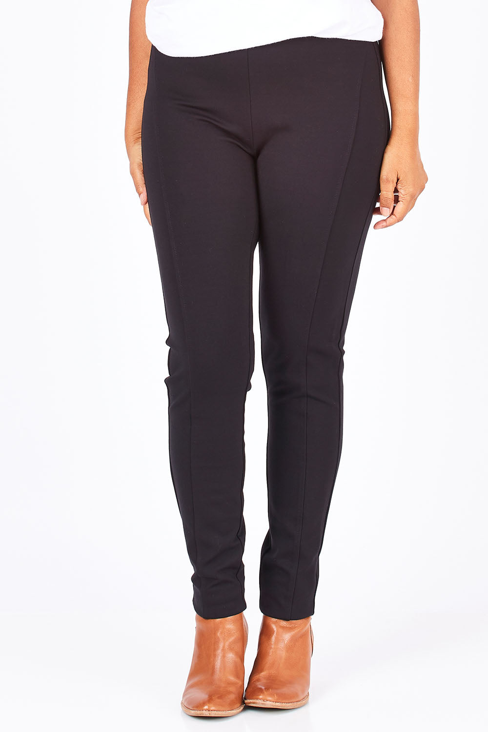 Model Nadine wearing size 10 of the Ponti Skinny Leg Pull On Pant in colour Black (Black), from the front, cropped image