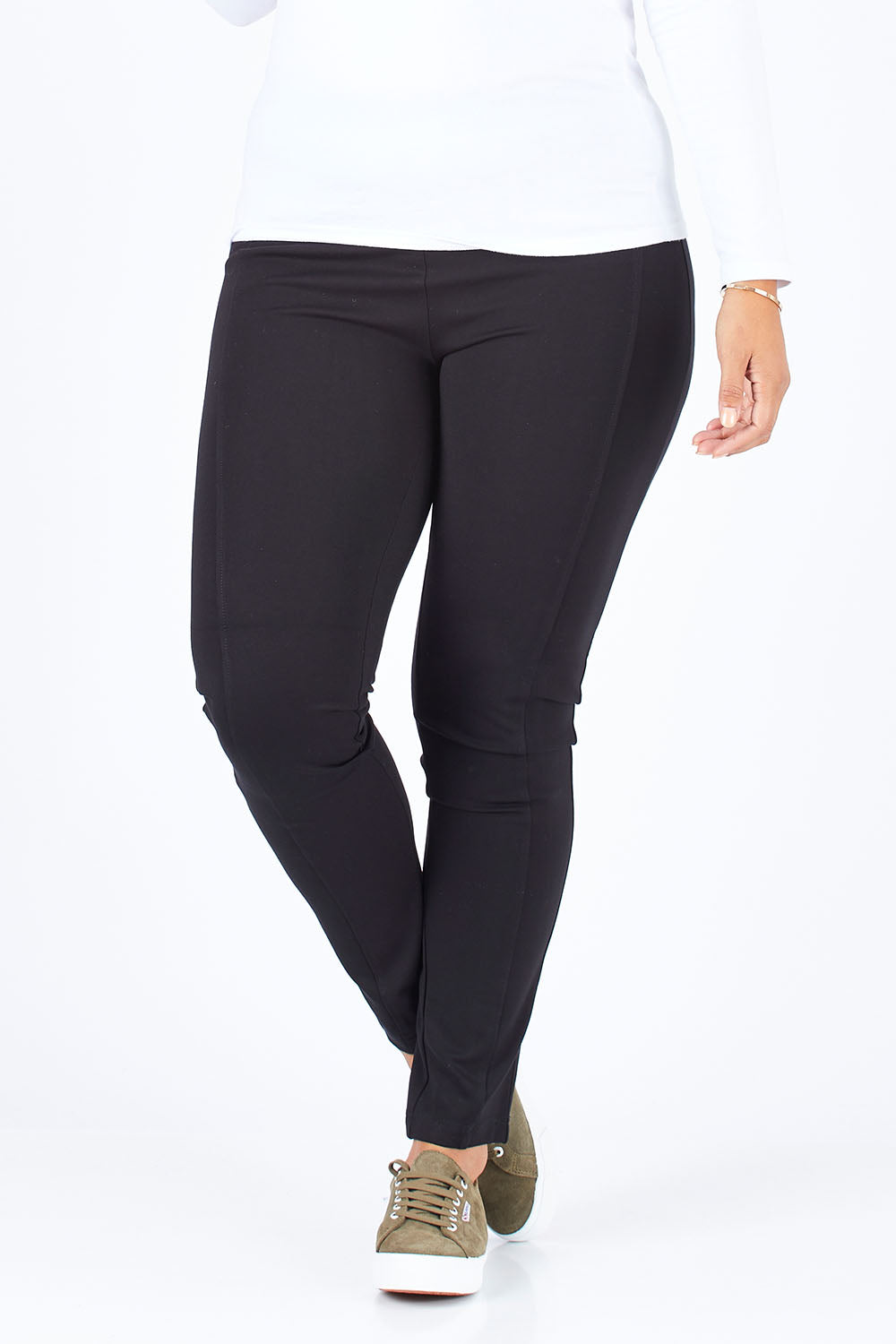 Model Palatina wearing size 14 of the Ponti Skinny Leg Pull On Pant in colour Black (Black), from the front, cropped image
