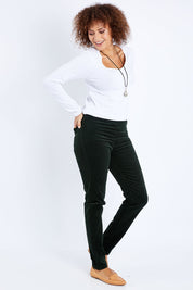 Model Lala wearing size 10 of the Skinny Leg Cord Pull On Pant in colour Forest (Green), from the front, showing the whole outfit
