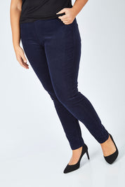 Model Fiona wearing size 16 of the Skinny Leg Cord Pull On Pant in colour Navy (Blue), from the front, cropped image