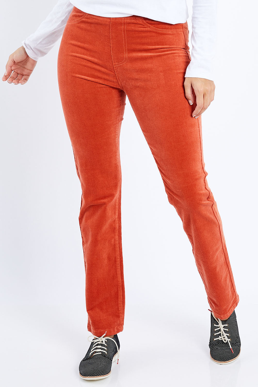 Model Lala wearing size 10 of the Pin Cord Slim Pant in colour Auburn, from the front, cropped image