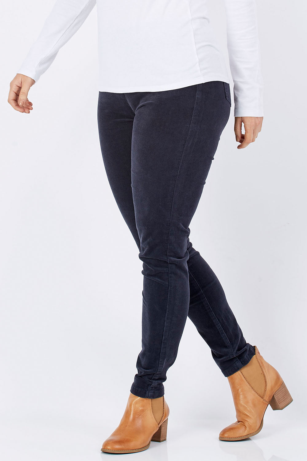 Model Laura wearing size 12 of the Pin Cord Slim Pant in colour Charcoal (Grey), from the front, cropped image