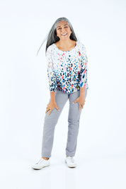 Model Nadine wearing size 10 of the Pin Cord Slim Pant in colour Cloud (Blue), from the front, showing the whole outfit