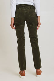 Model Madeline wearing size 10 of the Pin Cord Slim Pant in colour Deepsage (Green), from the back
