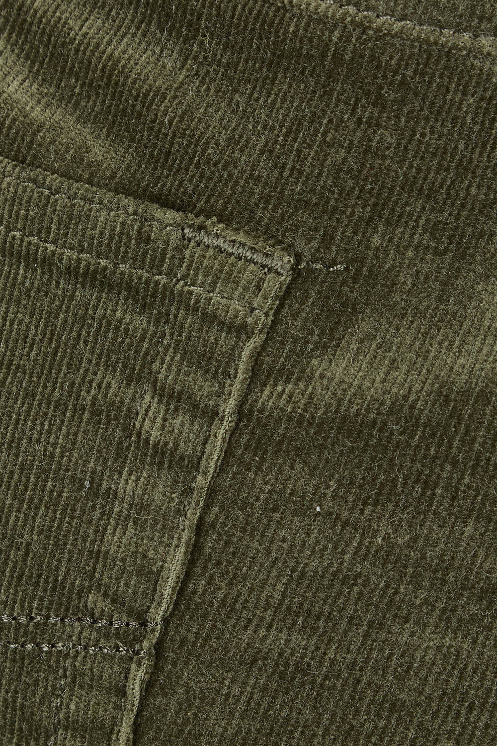 Product shot of the Pin Cord Slim Pant in colour Deepsage (Green), detail
