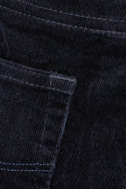 Product shot of the Pin Cord Slim Pant in colour Midnight (Blue), detail