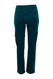 Product shot of the Pin Cord Slim Pant in colour Peacock (Green), from the back