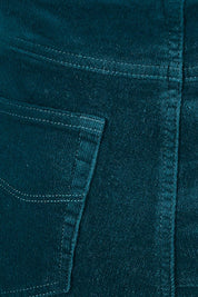 Product shot of the Pin Cord Slim Pant in colour Peacock (Green), detail