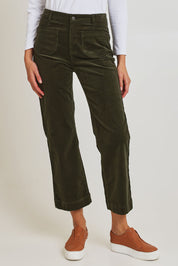 Model Madeline wearing size 10 of the Wide Leg Ankle Grazer Pant in colour Deepsage (Green), from the front, cropped image
