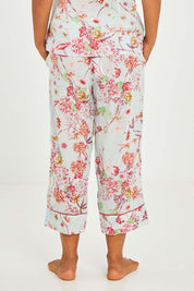 Model Olivia wearing size S of the Cotton 3/4 Pyjama Pant in colour Mintblue (Blue), from the back