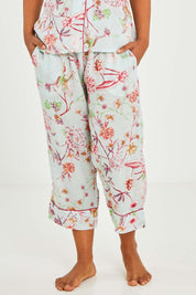 Model Olivia wearing size S of the Cotton 3/4 Pyjama Pant in colour Mintblue (Blue), from the front, cropped image