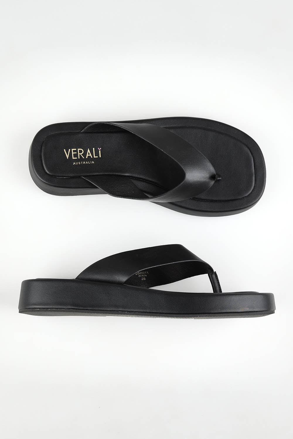 A model wearing size 37 of the Bouncer Ii Slide in colour Black (Black), from the front, showing the whole outfit
