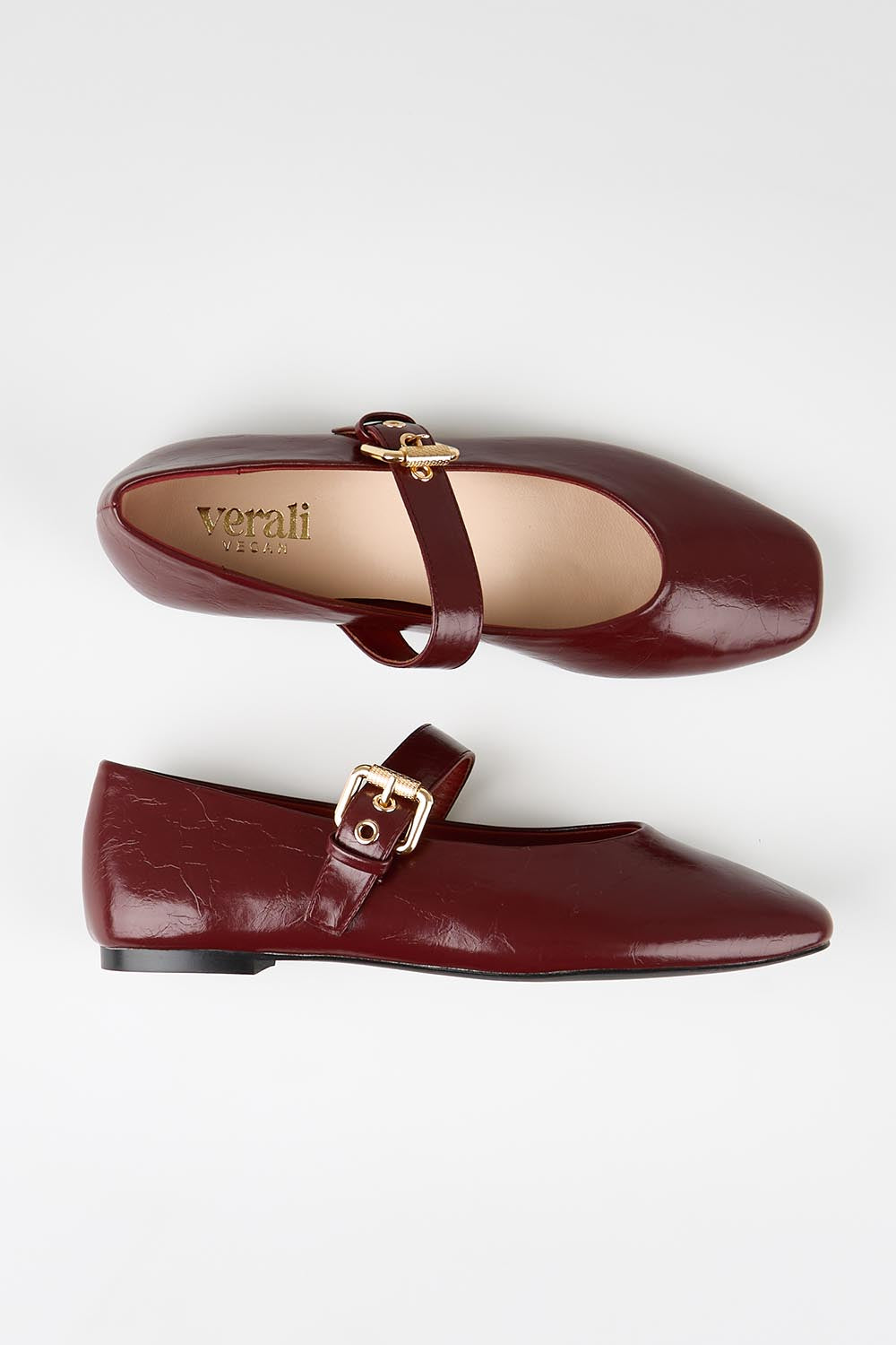 Model Genericm wearing size sample of the Europe Mary Jane Flat - Berryredcrinkle in colour Berryredcrinkle, from an angle