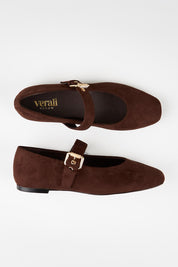 Model Genericm wearing size sample of the Europe Mary Jane Flat - Chocmicro in colour Chocmicro, from an angle